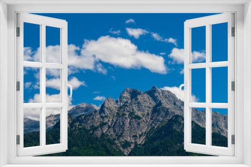 Fototapeta Naklejka Na Ścianę Okno 3D - Berg mit blauen Himmel