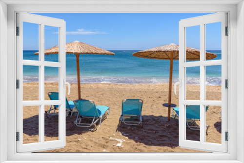 Fototapeta Naklejka Na Ścianę Okno 3D - Sunbeds with umbrellas on beautiful sandy Paleochori beach on Milos island. Cyclades, Greece.
