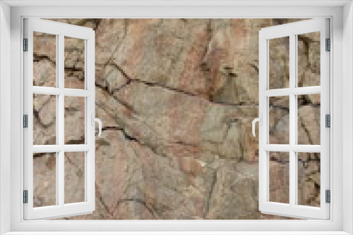 Fototapeta Naklejka Na Ścianę Okno 3D - Granite rocks with faults, background of old stones, destruction of a granite wall, ecological problems of the planet Earth, climate change, natural pattern, art