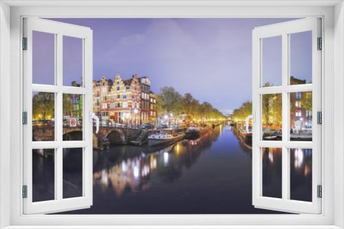 Fototapeta Naklejka Na Ścianę Okno 3D - Canals of Amsterdam. Moody night panorama of Rossebuurt district