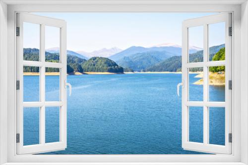 Fototapeta Naklejka Na Ścianę Okno 3D - Daylight view to Vidraru lake in Carpathian Mountains