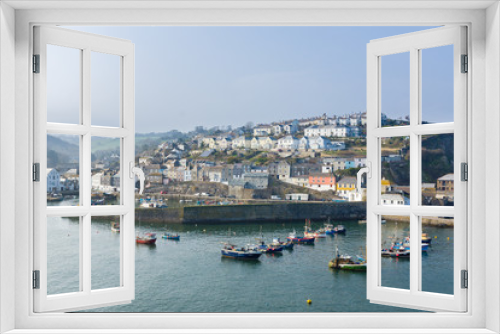 Fototapeta Naklejka Na Ścianę Okno 3D - The Cornish village of Mevagissey with a view of the harbour with traditional lobster and crab boats it is a popular destination for tourists and in an area of outstanding natural beauty