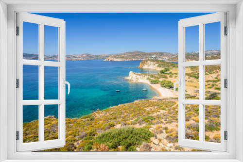 Fototapeta Naklejka Na Ścianę Okno 3D - Amazing sunny coast view to a empty holiday bay Didymes beach with crystal clear blue water sandy beach for sunbathing and some boats cruising fishing in background, Patmos Island, Dodecanese, Greece