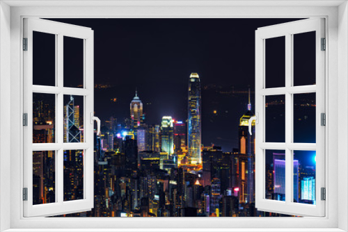 Fototapeta Naklejka Na Ścianę Okno 3D - City night view, huge towers in central, in Hong Kong