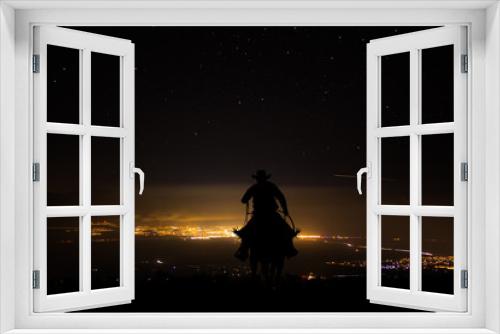 Fototapeta Naklejka Na Ścianę Okno 3D - Cowboy on a horse