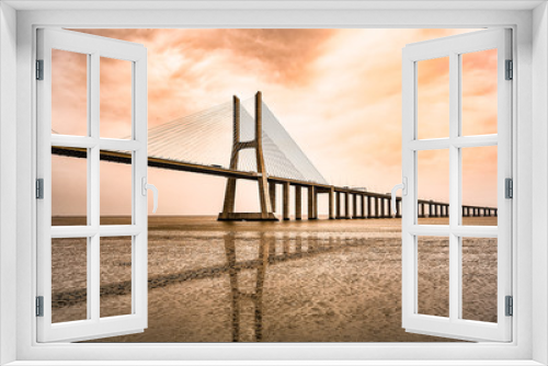 Fototapeta Naklejka Na Ścianę Okno 3D - The Vasco da Gama Bridge in Lisbon, Portugal in a summer day. beautiful colors