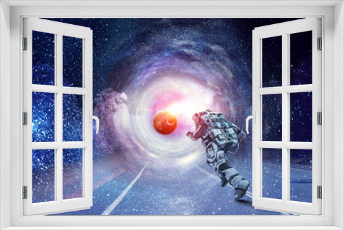 Fototapeta Naklejka Na Ścianę Okno 3D - Running spaceman and galaxy. Mixed media