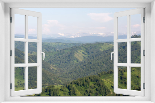Fototapeta Naklejka Na Ścianę Okno 3D - Beautiful mountain green landscape with big hills and snow mountains on background. Blue sky above greenery. Serenity and tranquility.