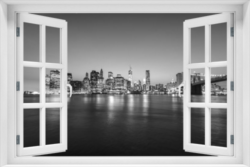 Fototapeta Naklejka Na Ścianę Okno 3D - New york city at night. Black and white manhattan skyline. USA.