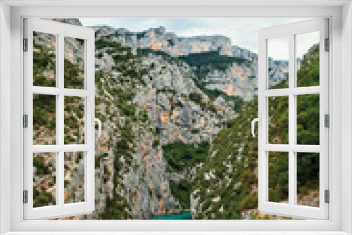 Fototapeta Naklejka Na Ścianę Okno 3D - Cliffs on the Verdon River on cloudy day, the river flows into the Lake of Sainte-Croix in the Verdon National Park. In Alpes-de-Haute-Provence department, Provence region, southeastern France