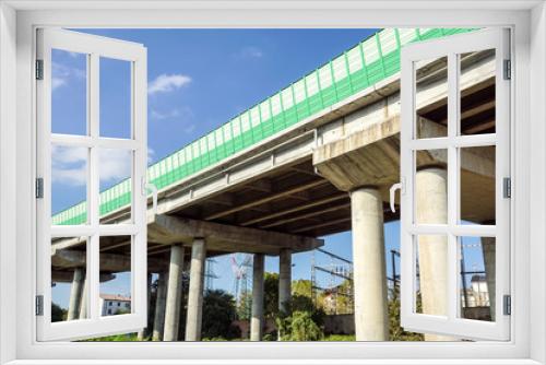 Fototapeta Naklejka Na Ścianę Okno 3D - Elevated expressway. The curve of suspension bridge . highway street
