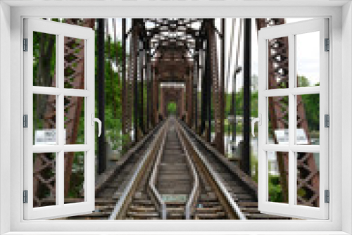 Fototapeta Naklejka Na Ścianę Okno 3D - A Rail road girder bridge in Augusta, Georgia.
