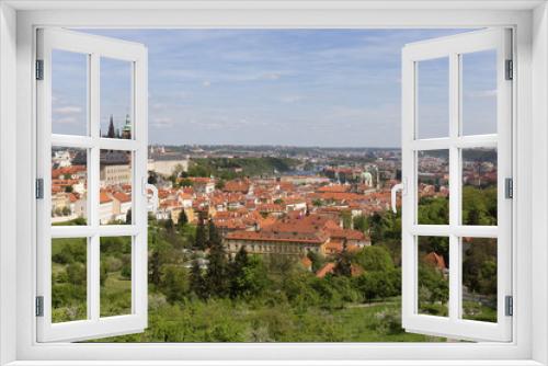 Fototapeta Naklejka Na Ścianę Okno 3D - View on the spring Prague City with the green Nature and flowering Trees, Czech Republic