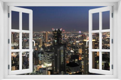 Fototapeta Naklejka Na Ścianę Okno 3D - The city view from Umeda Sky Building