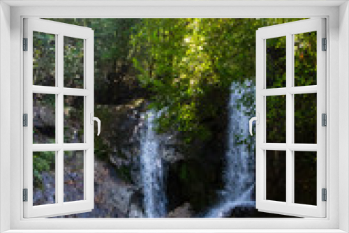 Fototapeta Naklejka Na Ścianę Okno 3D - Beautiful waterfall and river in a lush tropical rainforest