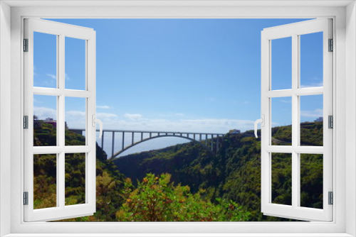 Fototapeta Naklejka Na Ścianę Okno 3D - The longest single span bridge in Europe crossing the valley leading from Los Tilos in Canary islands near to Los Sauces, La Palma, Spain
