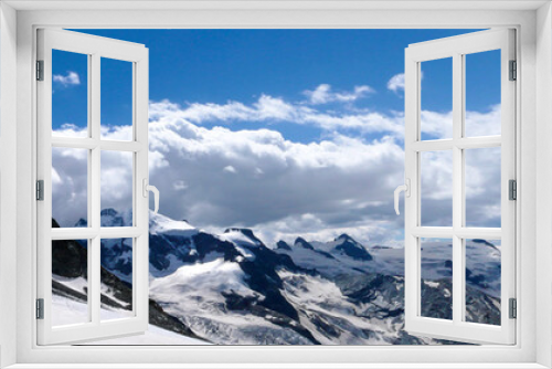 panorama view of mountain landscape with Piz Tschierva in the Swiss Alps on a beautiful summer day