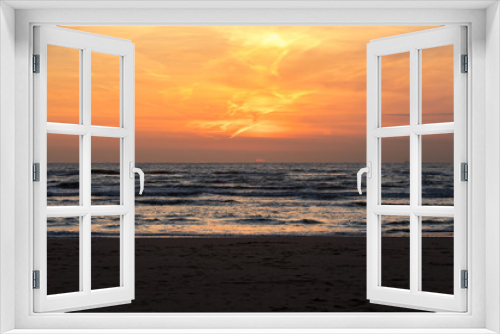 Fototapeta Naklejka Na Ścianę Okno 3D - Scenic View Of Sea Against Orange Sky