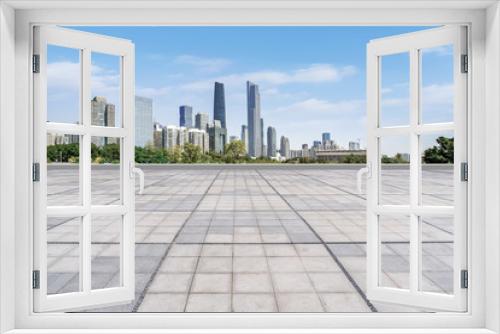 Fototapeta Naklejka Na Ścianę Okno 3D - Prospects for the empty square floor tiles of Guangzhou urban complex.