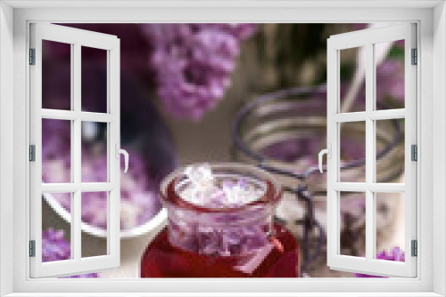 Fototapeta Naklejka Na Ścianę Okno 3D - LILAC syrup in glass jar.Style vintage