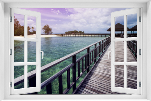 Fototapeta Naklejka Na Ścianę Okno 3D - Wooden Beach Dock or Wooden Pier at Tropical Beach