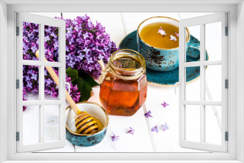 Fototapeta Naklejka Na Ścianę Okno 3D - Organic honey in glass jar, purple lilac