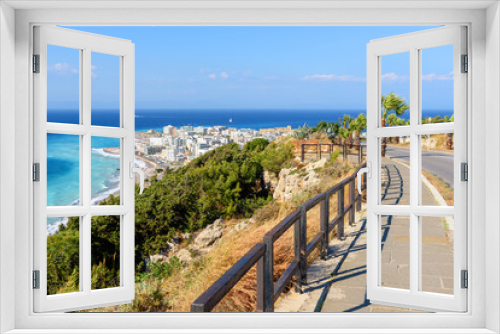 Fototapeta Naklejka Na Ścianę Okno 3D - Coastal promenade with view of Rhodes town. Greece