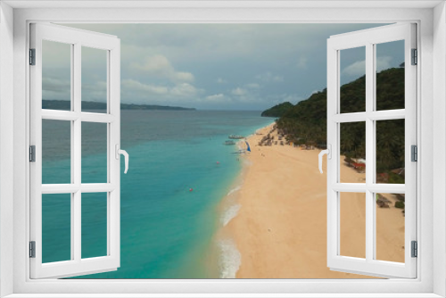 Fototapeta Naklejka Na Ścianę Okno 3D - Aerial view of beautiful tropical island with white sand beach, hotels and tourists, Boracay, Puka shell beach. Tropical lagoon with turquoise water and white sand. Beautiful sea, beach, resort