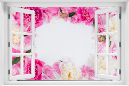 Fototapeta Naklejka Na Ścianę Okno 3D - Floral frame wreath made of pink and white peonies flower buds. Flat lay, top view.