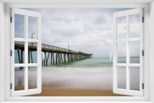 Fototapeta Naklejka Na Ścianę Okno 3D - Long exposure of the fishing pier and Atlantic Ocean, in Virginia Beach, Virginia.