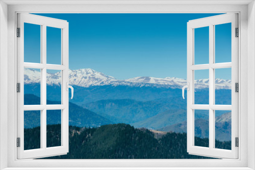 Fototapeta Naklejka Na Ścianę Okno 3D - Amazing views in the Caucasus mountains. Snow-capped peaks, blue sky, sunny day