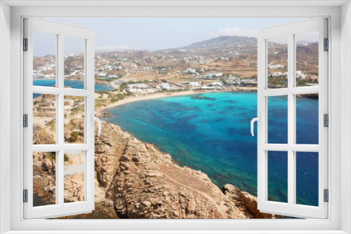 Fototapeta Naklejka Na Ścianę Okno 3D - Aerial drone bird's eye view of famous Paraga beach featuring iconic beach bar of Skorpios and Santa Anna, Mykonos island, Cyclades, Greece