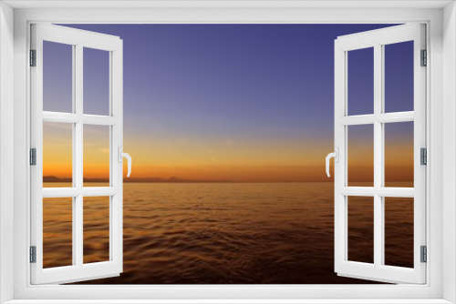 Fototapeta Naklejka Na Ścianę Okno 3D - Beautiful sunset sunrise over blue sea ocean red  sky