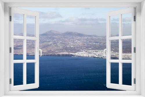 Fototapeta Naklejka Na Ścianę Okno 3D - View on Puerto del Carmen resort on the southeast coast of Lanzarote