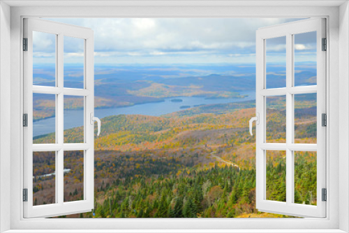 Fototapeta Naklejka Na Ścianę Okno 3D - Lake Tremblant and Mont-Tremblant village in fall with fall foliage, from top of Mont Tremblant, Quebec, Canada.