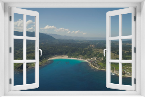 Fototapeta Naklejka Na Ścianę Okno 3D - Aerial view of beautiful tropical beach with turquoise water in blue lagoon, Pagudpud, Philippines. Ocean coastline with sandy beach. Tropical landscape in Asia.