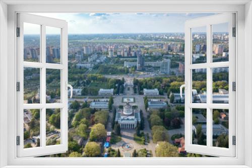 Fototapeta Naklejka Na Ścianę Okno 3D - Panorama of the city of Kiev and the Exhibition Center against the sky in the spring. Photo from the drone