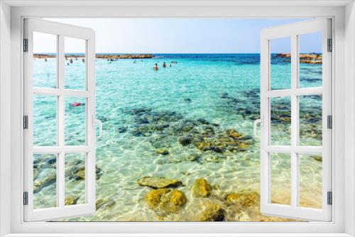 Fototapeta Naklejka Na Ścianę Okno 3D - Daylight view to Nissi Beach with colorful bright blue water and sky