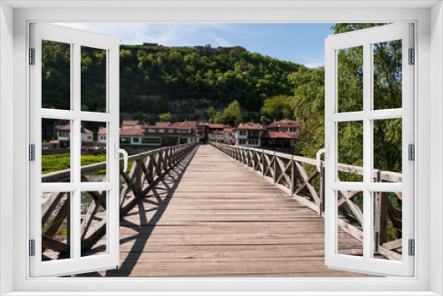 Fototapeta Naklejka Na Ścianę Okno 3D - Old wooden bridge - famous landmark of Veliko Tarnovo, old capital of Bulgaria. Photo was taken at sunny spring day.
