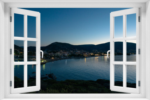 Fototapeta Naklejka Na Ścianę Okno 3D - The bay of Porto Rafti in Greece at sunset