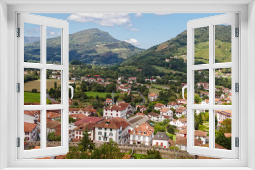 Beautiful panorama view of the town and the surrounding green countryside from the Mendiguren Citadel - Saint Jean Pied de Port, France