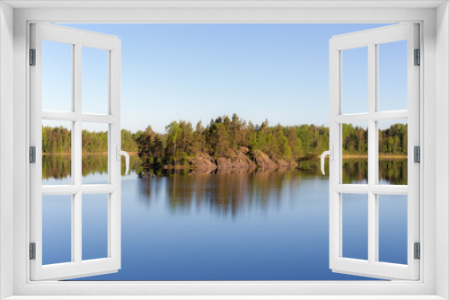 Fototapeta Naklejka Na Ścianę Okno 3D - rocky island on a forest lake