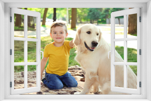 Fototapeta Naklejka Na Ścianę Okno 3D - Cute little child with his pet in green park