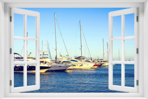Fototapeta Naklejka Na Ścianę Okno 3D - Sunset view to rich yachts parked in local port