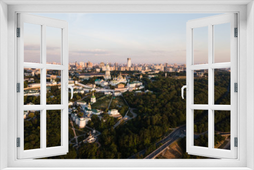 Fototapeta Naklejka Na Ścianę Okno 3D - Aerial top view of Kiev Pechersk Lavra churches on hills from above, cityscape of Kyiv city