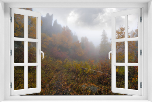 Fototapeta Naklejka Na Ścianę Okno 3D - Autumn valley in mist. Taganay National Park. Ural, Russia