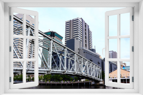 Fototapeta Naklejka Na Ścianę Okno 3D - (東京都ｰ都市風景)天王洲の川沿いにかかる鉄橋１