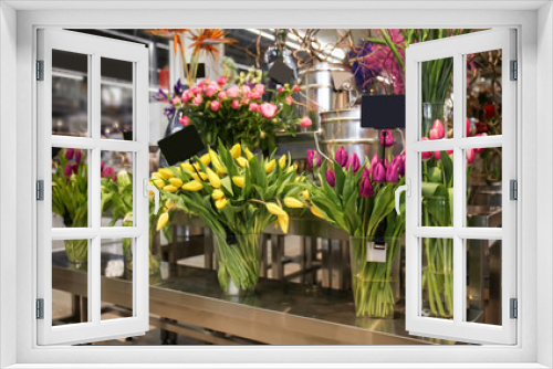 Fototapeta Naklejka Na Ścianę Okno 3D - Assortment of beautiful tulips in flower shop
