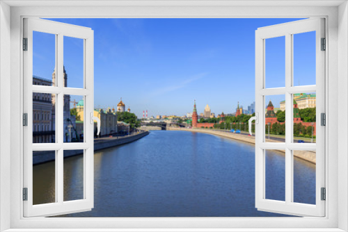 Moskva river near Moscow Kremlin on a blue sky background in sunny summer morning