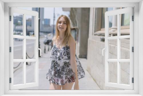 Outdoors portrait of beautiful young woman. Selective focus.